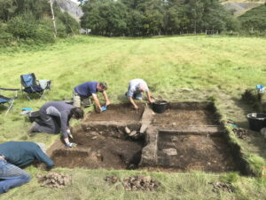 Excavating the furnace site on the valley floor at Penparc